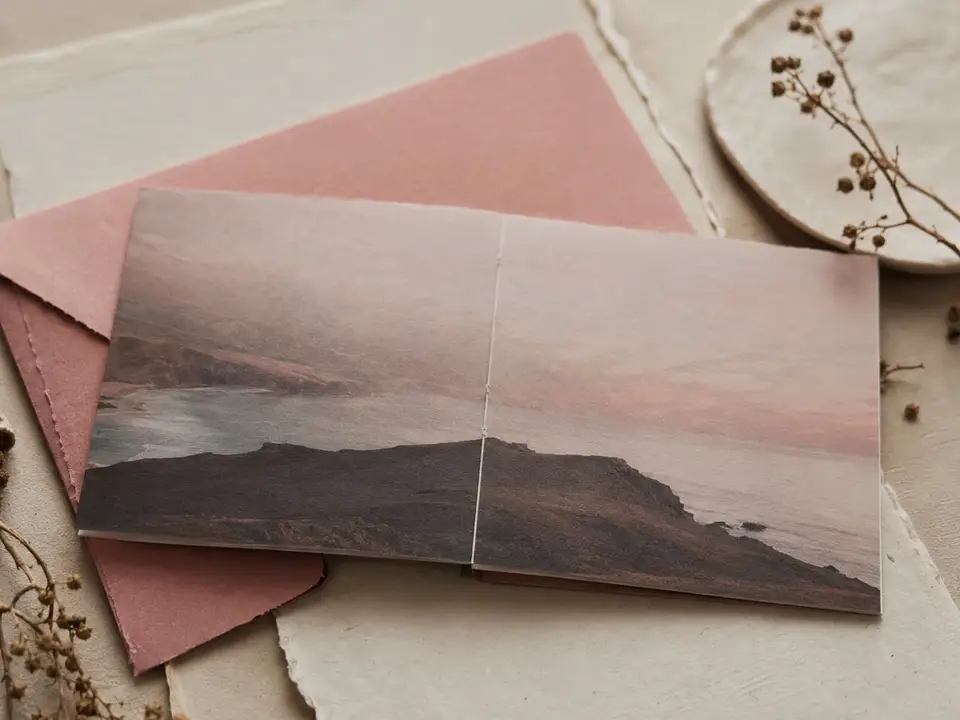 Image-led wedding invitation zine with a full-bleed landscape cover